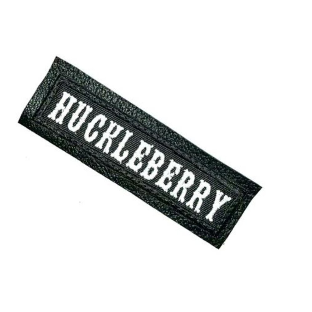HUCKLEBERRY badge shine them on with this feisty biker patch sewn onto leather